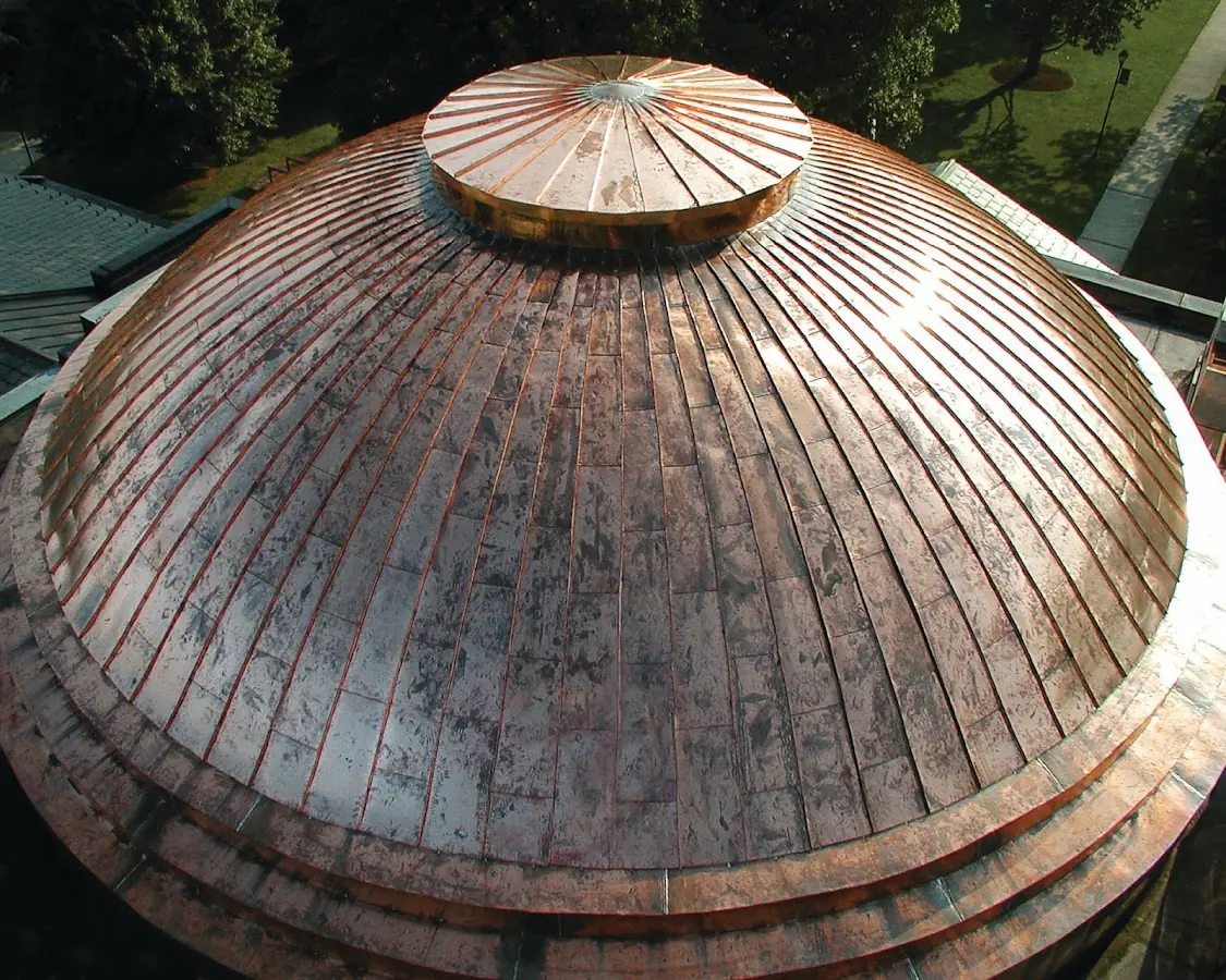 Craftsman Roofing crew installing a new roof in Shirley Center